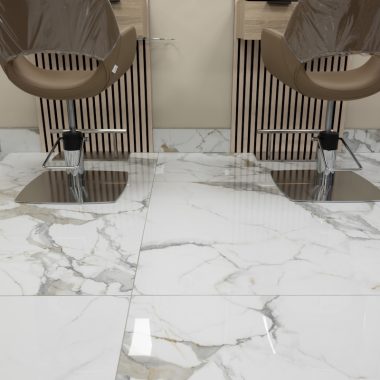 a pair of chairs sitting on top of a marble floor