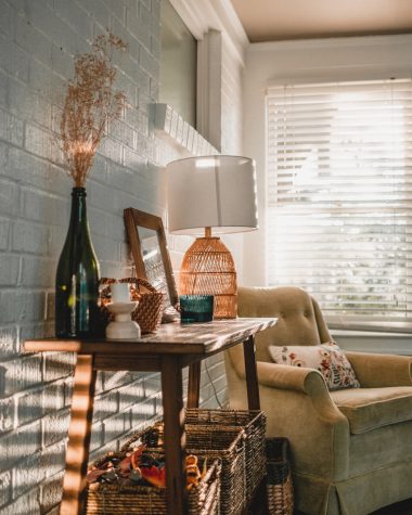 a living room with a chair and a table